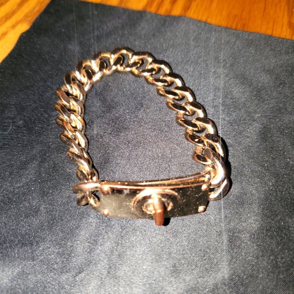 Coach twist clasp rose gold tone bracelet